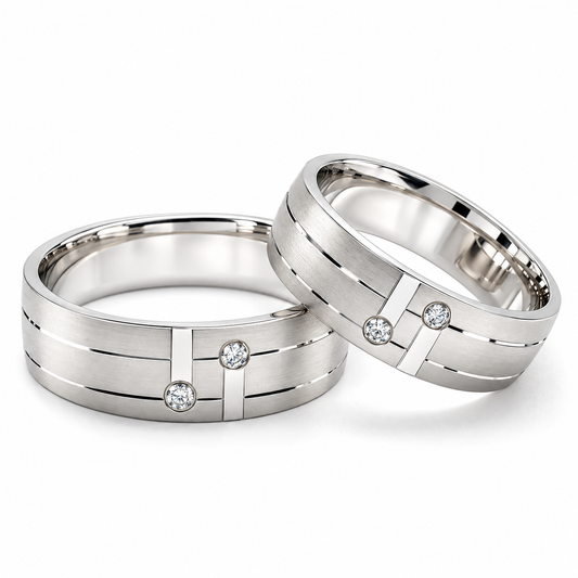 Argollas de matrimonio en oro blanco con circonias y diseño geométrico | 20B41LQ