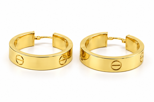 Arracadas anchas con círculos grabados en oro amarillo de 10K | 61AR10394LQ