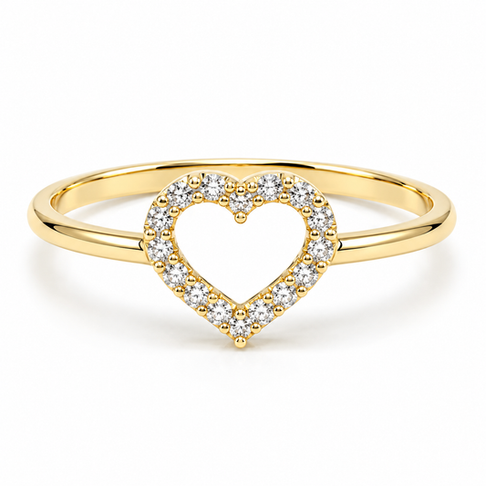 10MP10029LQ Anillo en oro amarillo de 10 Kilates con circonias simulando un corazón.