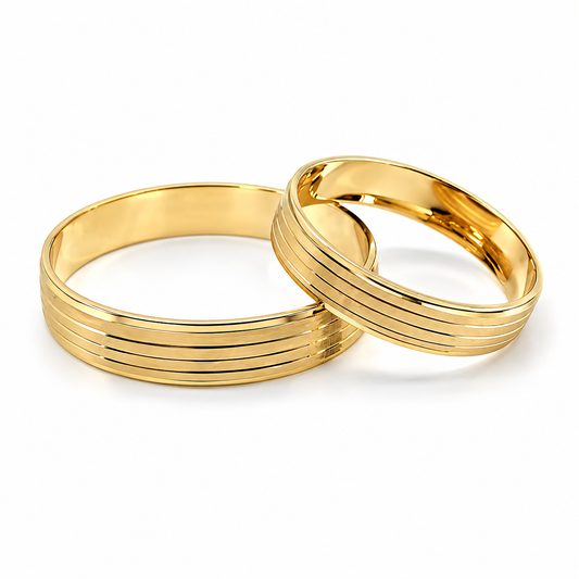 18D17-4LQ  Argollas de Matrimonio en oro amarillo de 10 Kilates.