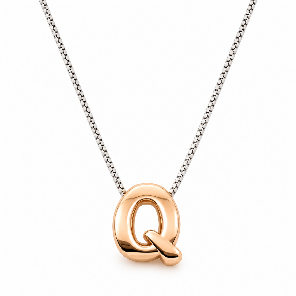 Inicial Q en 3D oro 14K Amarillo