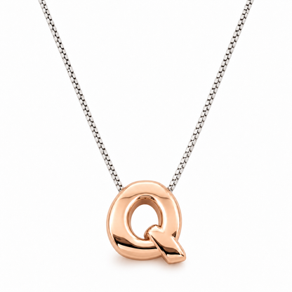 Inicial Q en 3D oro 14K Rosa