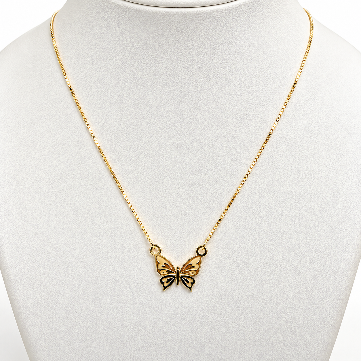 6040148LQ Cadena en oro amarillo/blanco/rosa con dije en forma de Mariposa.