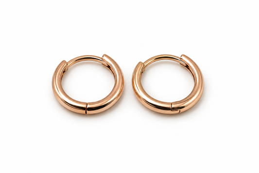 Arracadas huggie lisas en oro rosa de 10K | 61AR10200LQ